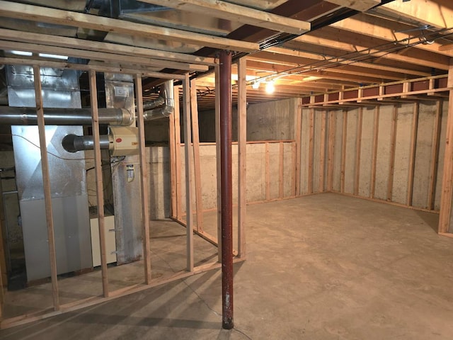 basement featuring heating unit