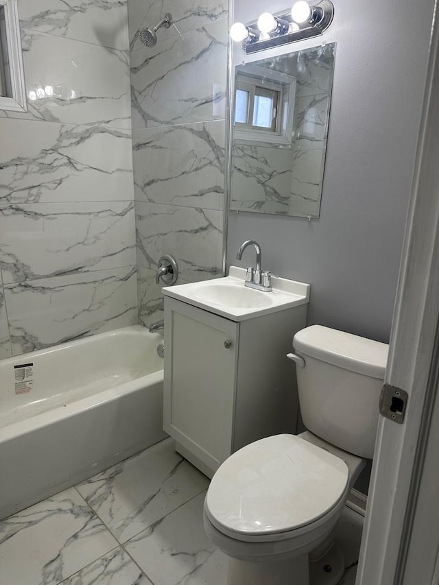 full bathroom with toilet, vanity, and tiled shower / bath combo