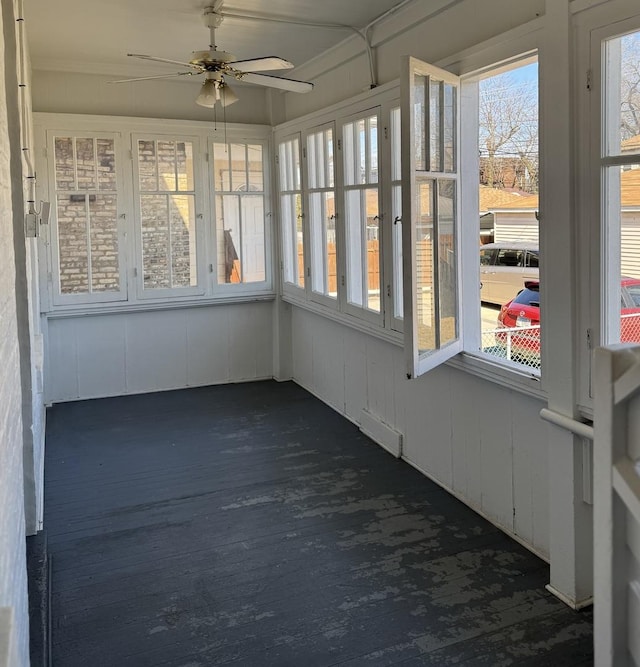 1907 S 49th Ct, Cicero, IL 60804 - unfurnished sunroom with a wealth of natural light, visible vents, and a ceiling fan