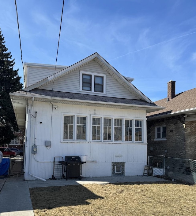 1907 S 49th Ct, Cicero, IL 60804 - view of side of property with fence and a shingled roof