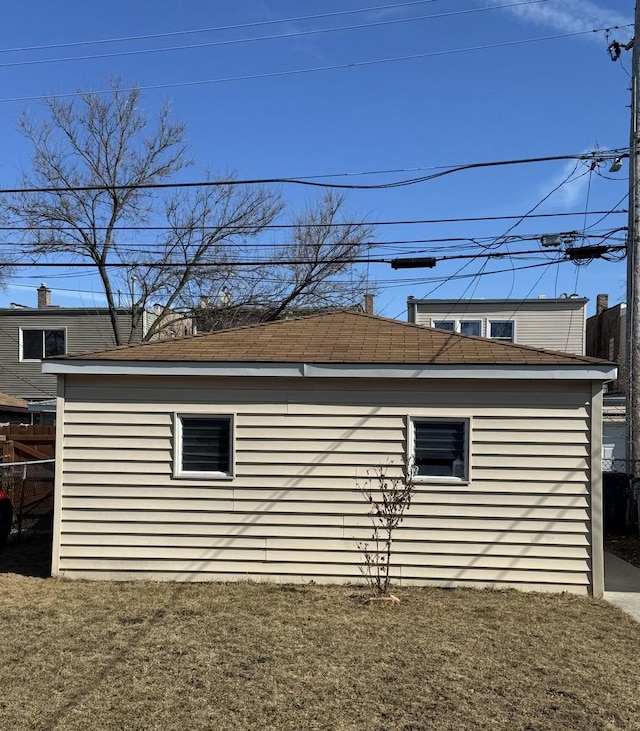 1907 S 49th Ct, Cicero, IL 60804 - view of side of home with an outbuilding, a yard, and fence
