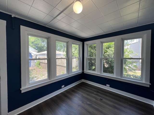 unfurnished sunroom featuring a wealth of natural light