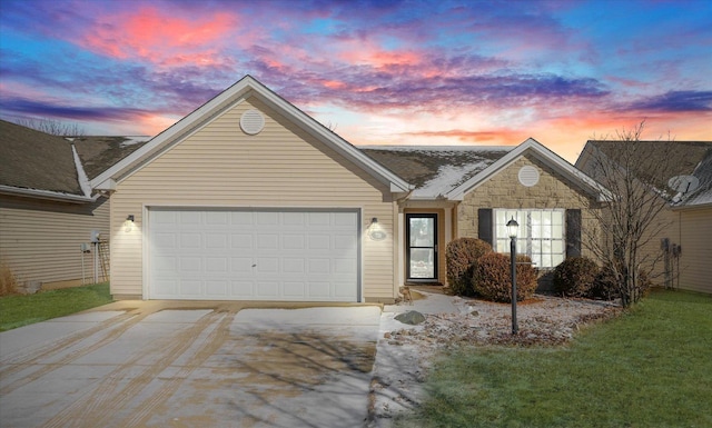 ranch-style home with a front yard, stone siding, driveway, and an attached garage