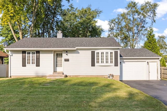 ranch-style house with aphalt driveway, a garage, fence, a chimney, and a front yard