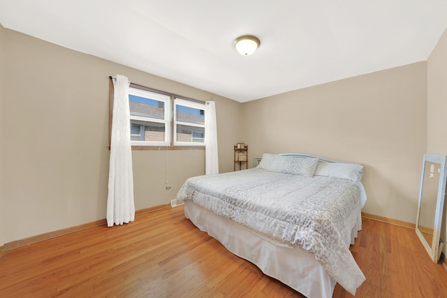 bedroom with light hardwood / wood-style flooring