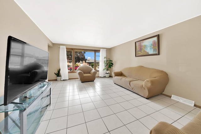 living room with light tile patterned floors