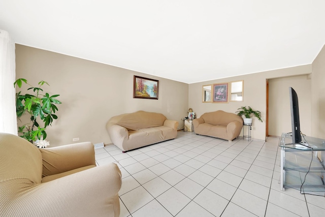 living room featuring light tile patterned flooring