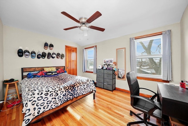 bedroom featuring light hardwood / wood-style floors and ceiling fan