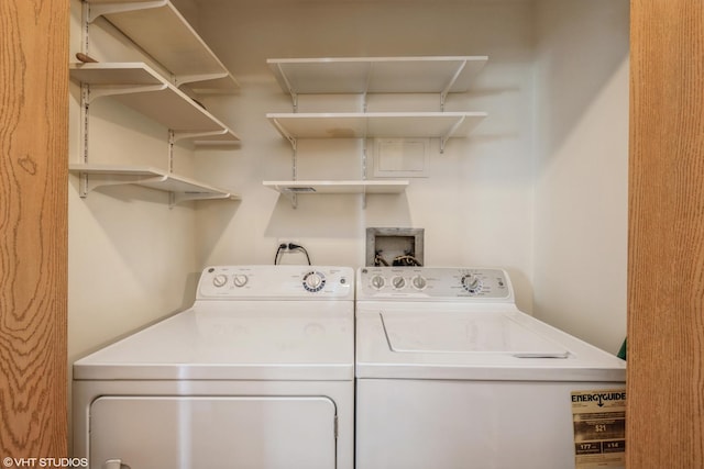 laundry room featuring laundry area and separate washer and dryer