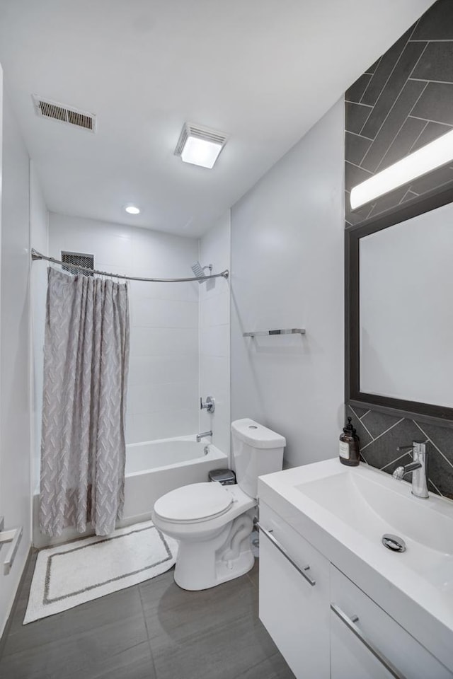 bathroom with vanity, toilet, shower / bathtub combination with curtain, and visible vents