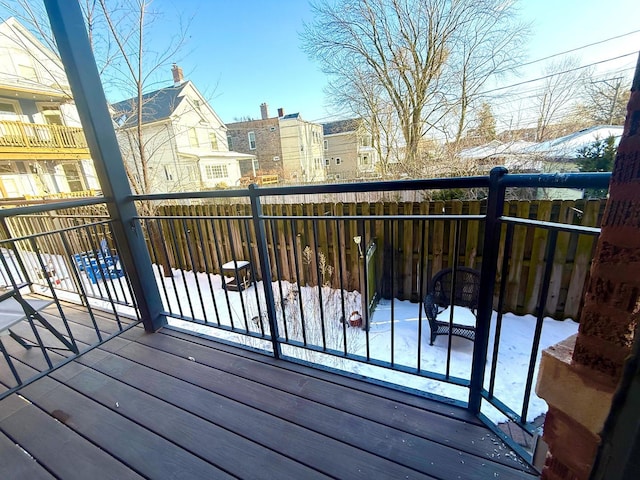 view of snow covered deck