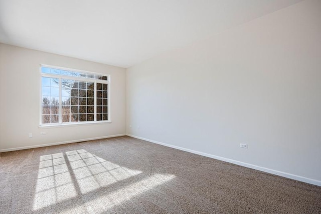 empty room featuring carpet flooring