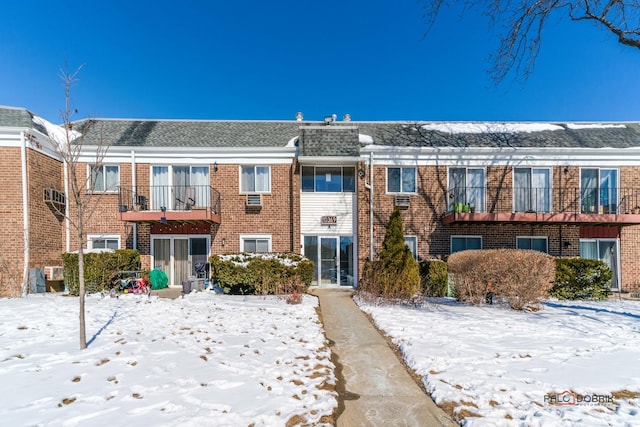 view of snow covered property