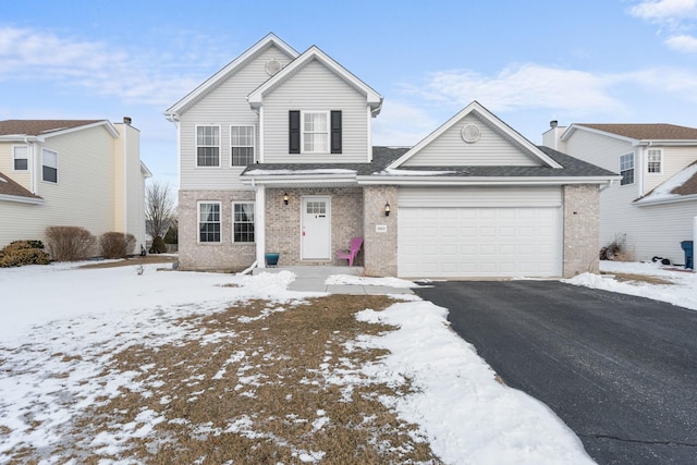 view of front property with a garage