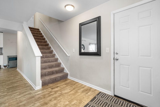 entrance foyer with light hardwood / wood-style floors