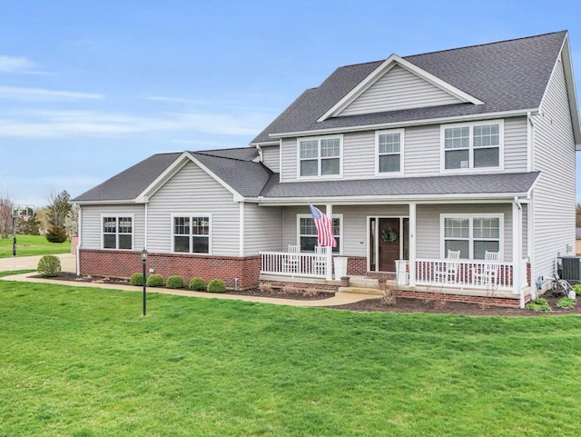 5 Fieldcrest Dr, Monticello, IL 61856 - traditional home featuring a porch and a front lawn