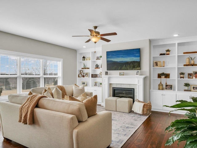 5 Fieldcrest Dr, Monticello, IL 61856 - living room with dark wood-style floors, a ceiling fan, a fireplace, built in shelves, and recessed lighting