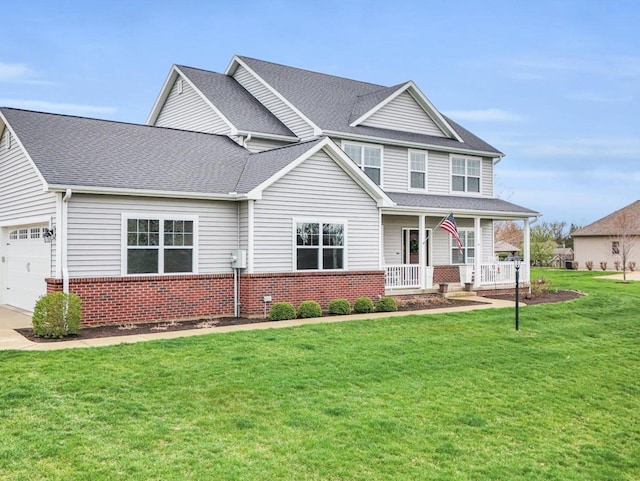 5 Fieldcrest Dr, Monticello, IL 61856 - view of front of home featuring a porch, brick siding, a front lawn, and a shingled roof