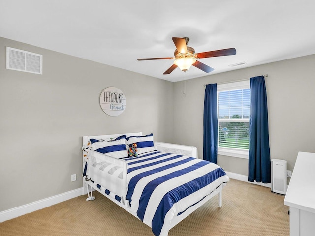 5 Fieldcrest Dr, Monticello, IL 61856 - bedroom featuring light colored carpet, baseboards, and ceiling fan