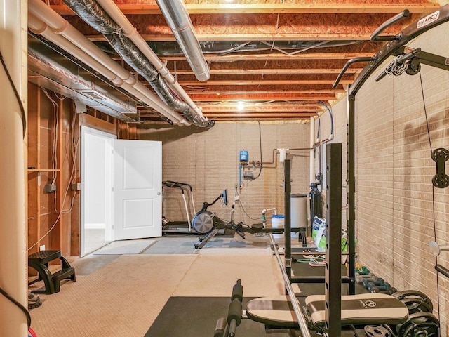 5 Fieldcrest Dr, Monticello, IL 61856 - exercise room featuring brick wall