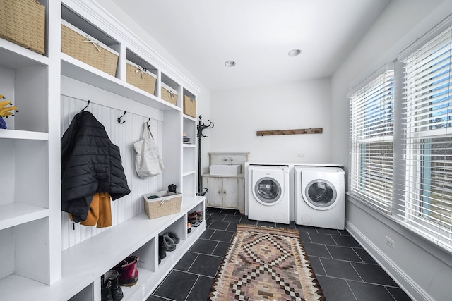 mudroom featuring recessed lighting, washing machine and dryer, baseboards, and tile patterned floors