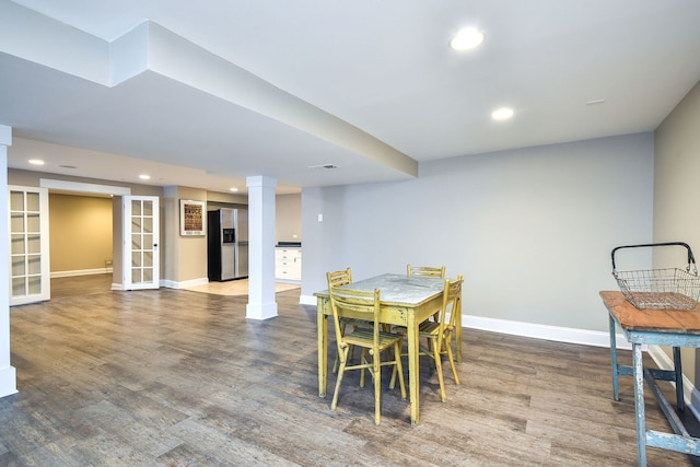 dining space with recessed lighting, visible vents, baseboards, wood finished floors, and ornate columns