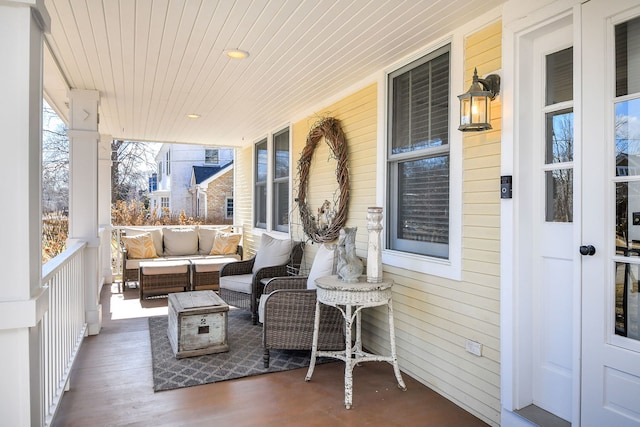 exterior space with outdoor lounge area and a porch