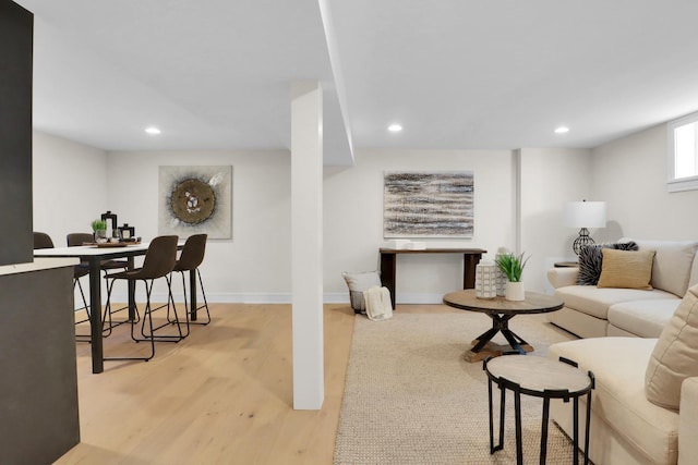 living room with light hardwood / wood-style flooring