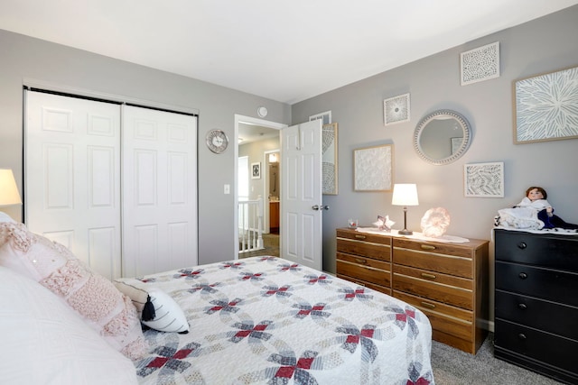 bedroom featuring carpet floors and a closet