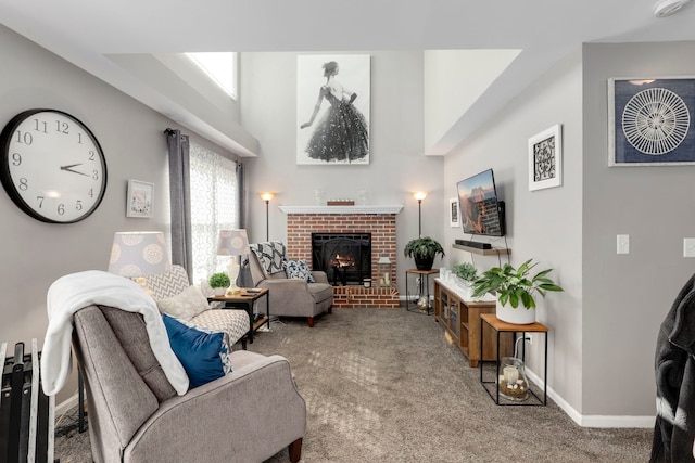 living room with carpet floors, a fireplace, and baseboards