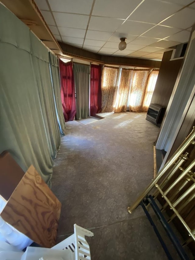 interior space featuring a paneled ceiling