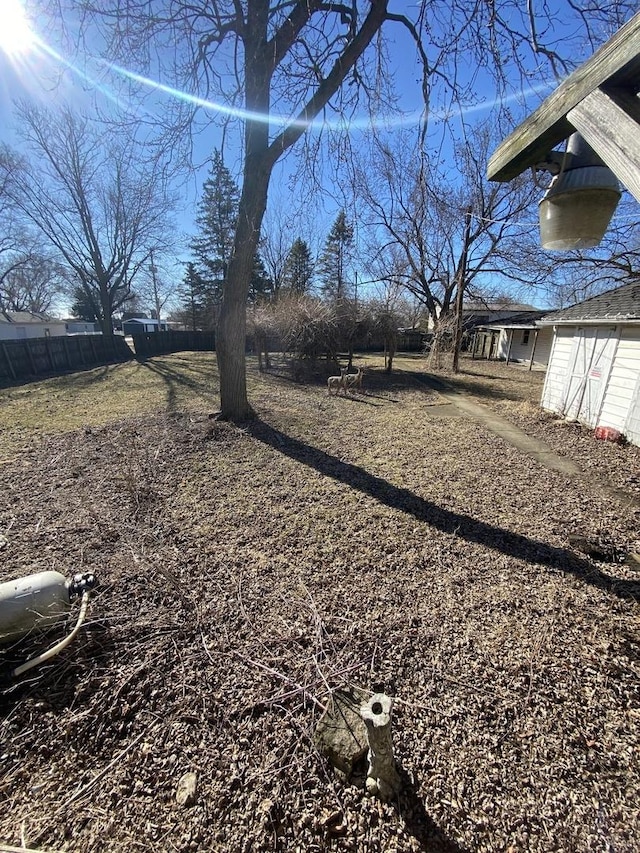 view of yard featuring fence