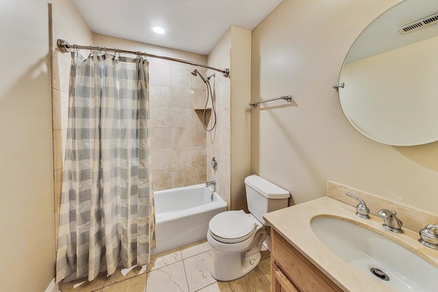 bathroom featuring toilet, visible vents, shower / bath combo with shower curtain, and vanity