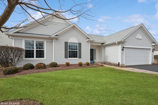 ranch-style house with a front yard, roof with shingles, driveway, and an attached garage