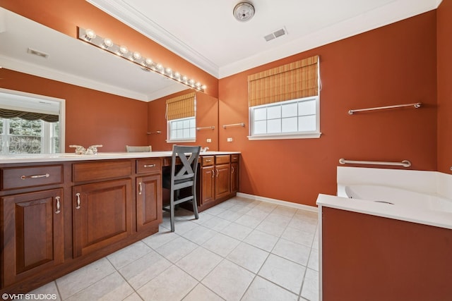 full bathroom with tile patterned flooring, visible vents, two vanities, and ornamental molding