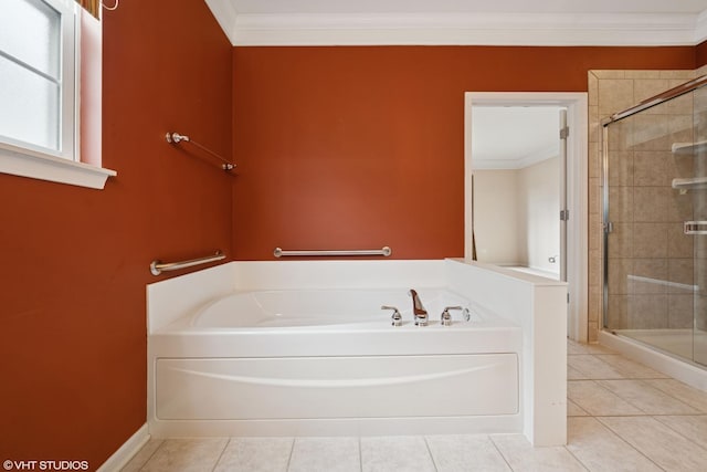 full bath featuring a garden tub, a shower stall, ornamental molding, and tile patterned floors