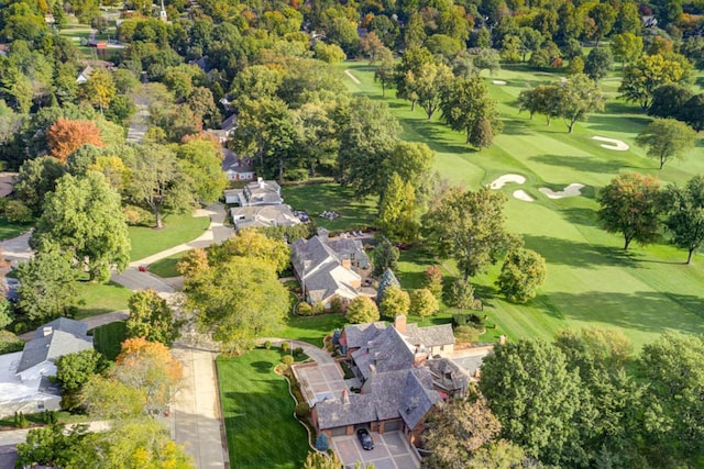 birds eye view of property with view of golf course