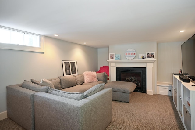 living room with carpet, a fireplace, and recessed lighting