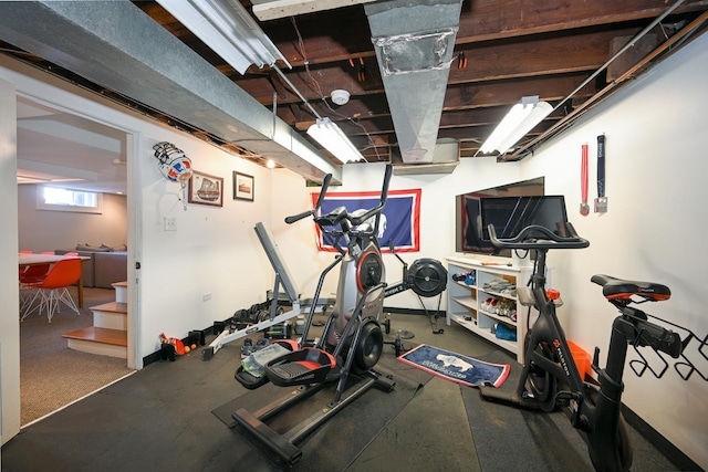 workout area featuring washer and dryer