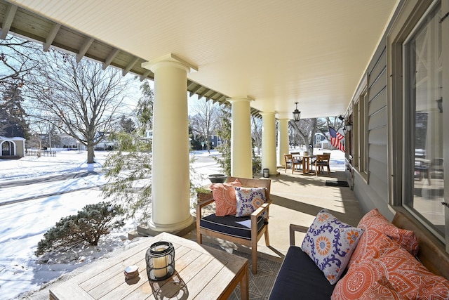 view of snow covered patio