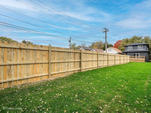 view of yard with fence