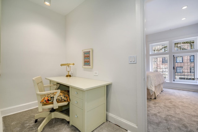 office space featuring baseboards, recessed lighting, and light colored carpet