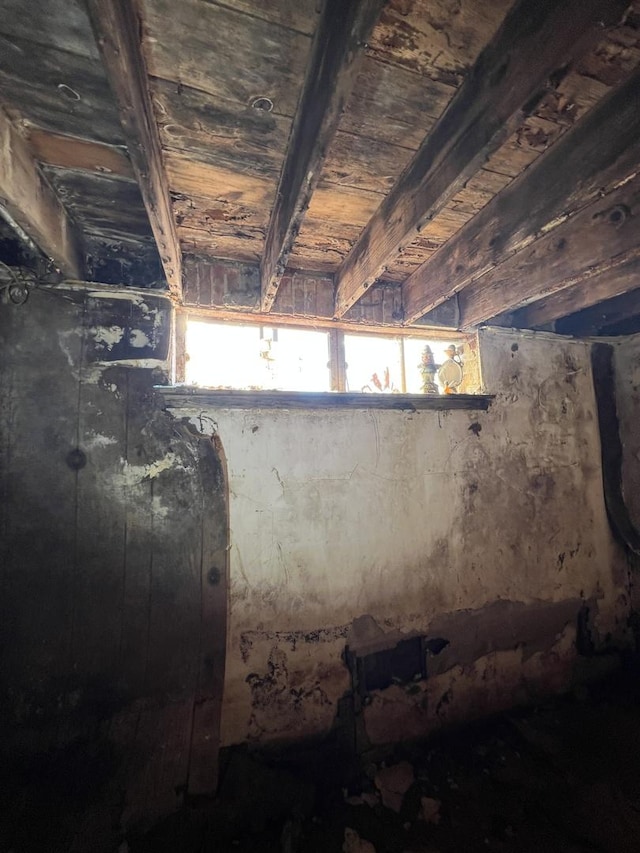 interior space with wood ceiling and beamed ceiling