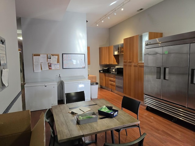 2147 W Belmont Ave, Chicago, IL 60618 - dining space with light wood-type flooring and visible vents