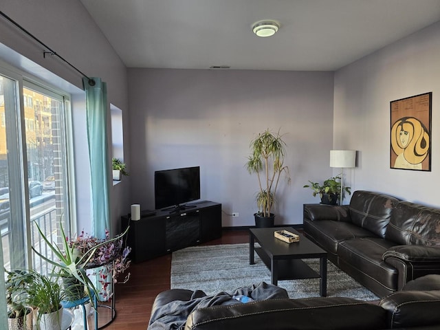 2147 W Belmont Ave, Chicago, IL 60618 - living room featuring dark wood-style flooring