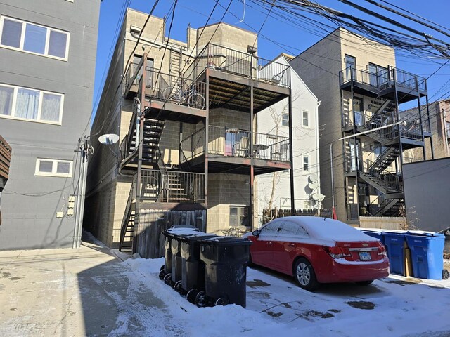2147 W Belmont Ave, Chicago, IL 60618 - snow covered building featuring stairs