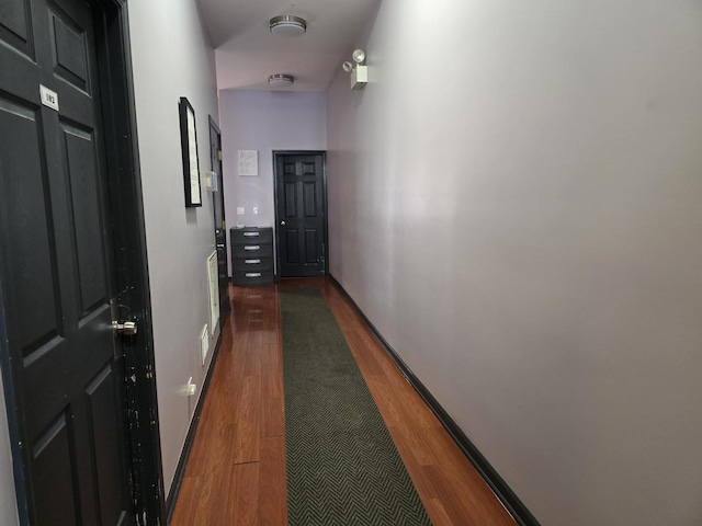 2147 W Belmont Ave, Chicago, IL 60618 - corridor with baseboards and dark wood finished floors