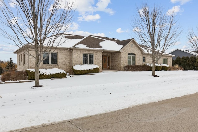 ranch-style house with brick siding