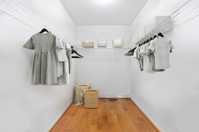 spacious closet featuring wood finished floors