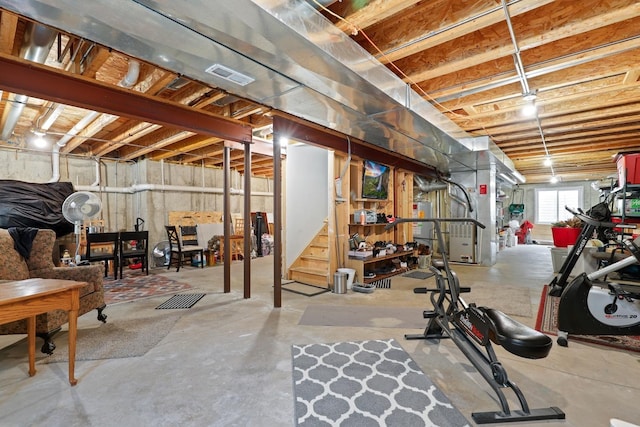 basement with stairway and visible vents